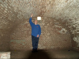 Peter Owen, Wilfred's nephew, in the 'smoky cellar'